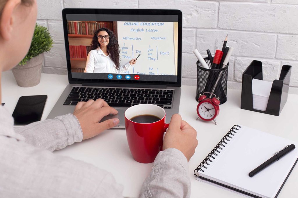 woman-drinking-morning-coffee-in-red-cup-learning-2022-12-16-07-58-47-utc